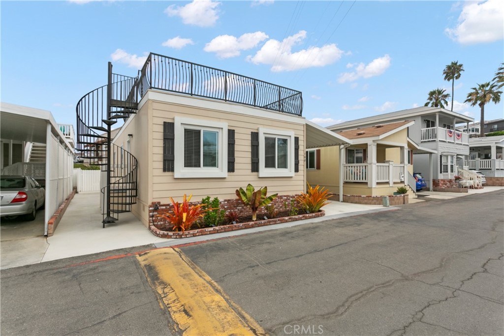 108 Bay Drive San Clemente, CA 92672 - Photo 6 of 28 a front view of a house with many windows
