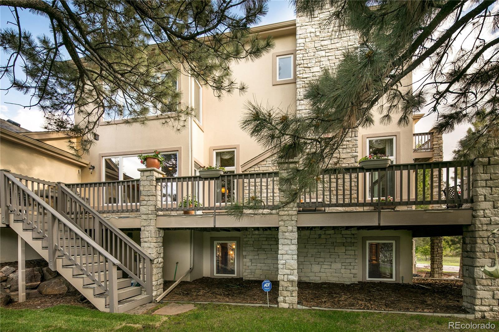 8397 Windhaven Drive Parker, CO 80134 - Photo 34 of 35 a view of residential houses with yard and deck