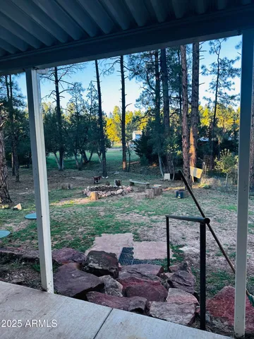 a backyard of a house with seating space