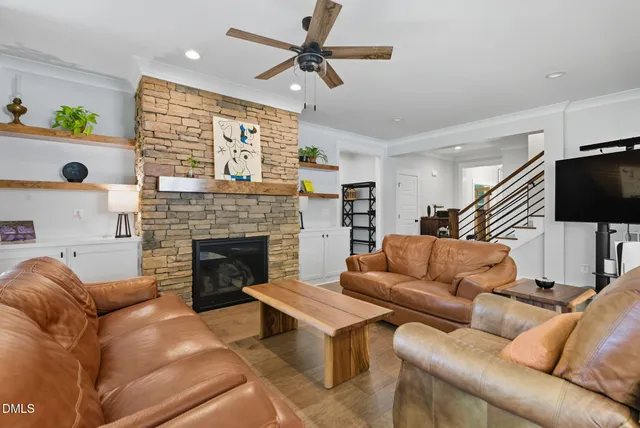 a kitchen with stainless steel appliances granite countertop counter space a sink and a refrigerator