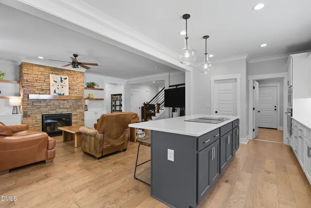 a kitchen with a stove and a microwave