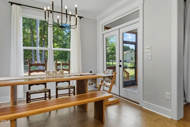 a en suite bathroom with a sink a mirror and a shower