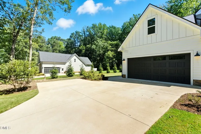 a black and white photo of a bench