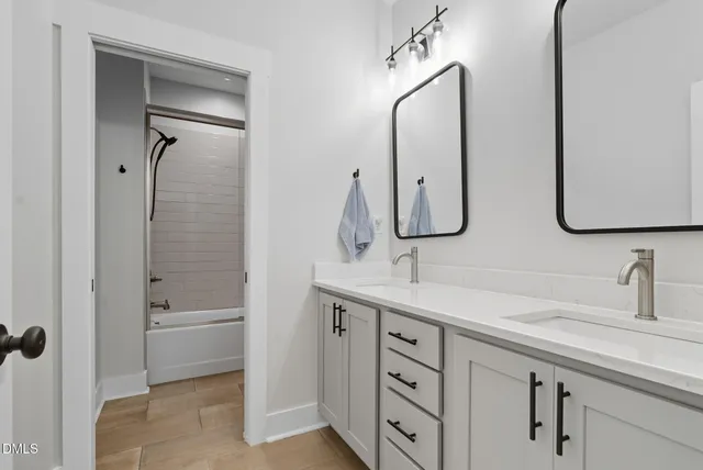 a view of a house with wooden floor and a fence