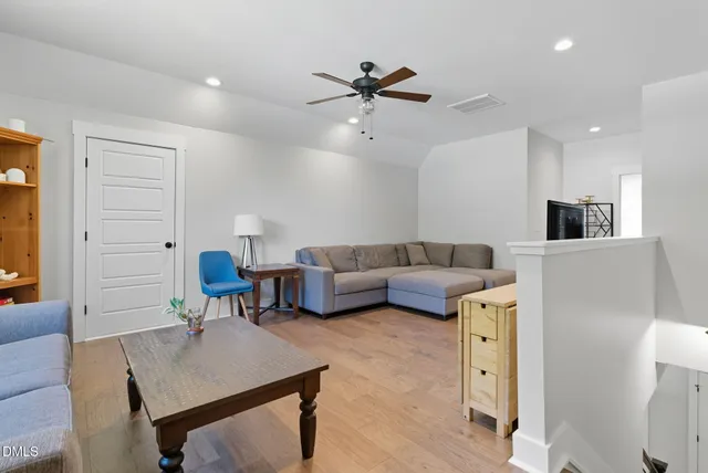 a view of a tree in front of a house
