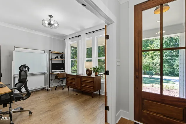a bathroom with a sink toilet and mirror