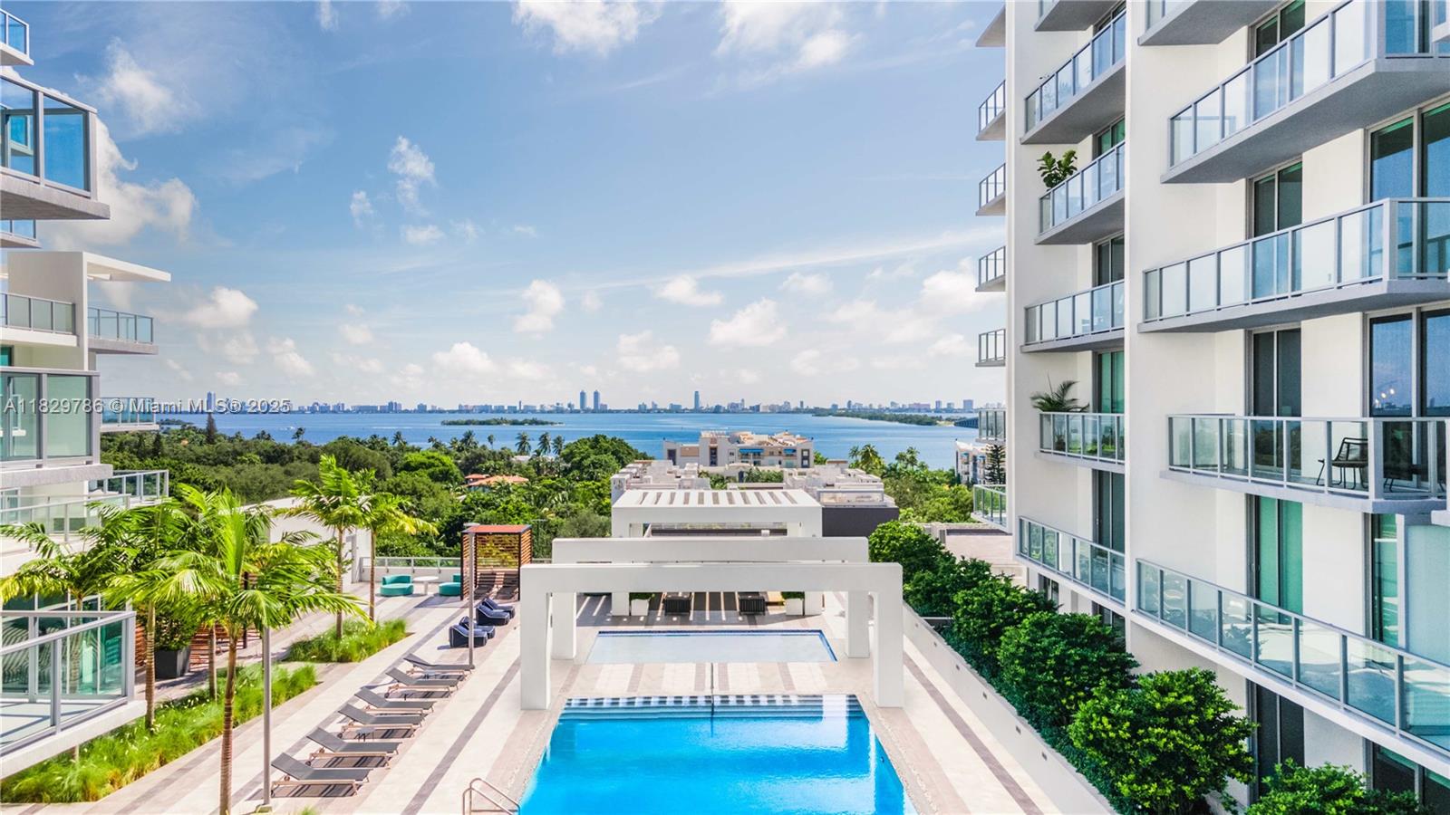 3900 Biscayne Boulevard, Unit S818 Miami, FL 33137 - Photo 9 of 32 a view of a tall buildings from a balcony