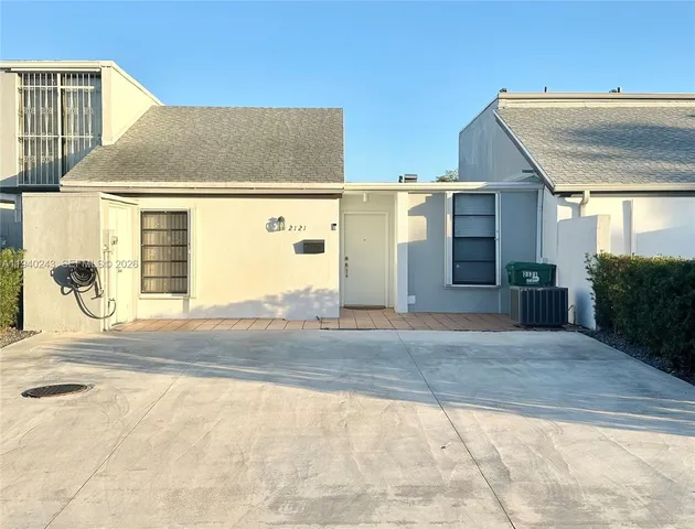 a view of garage with wooden floor