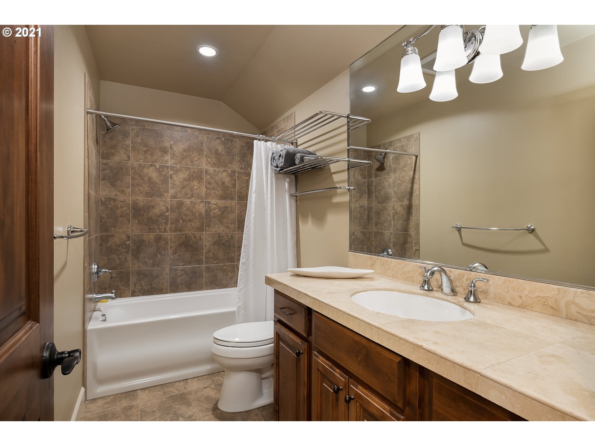20484 South Springwater Road Estacada, OR 97023 - Photo 26 of 32 a bathroom with a granite countertop sink toilet and shower