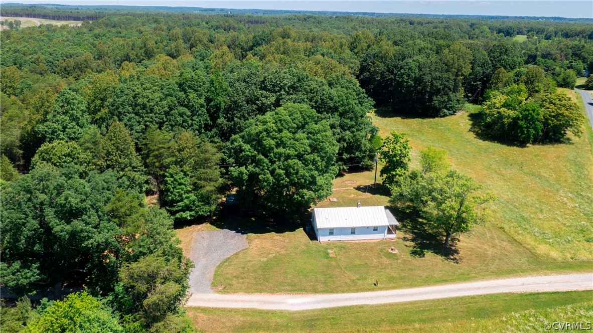 60 Rodeo Lane Dillwyn, VA 23936 - Photo 40 of 45 a view of a garden with a fountain