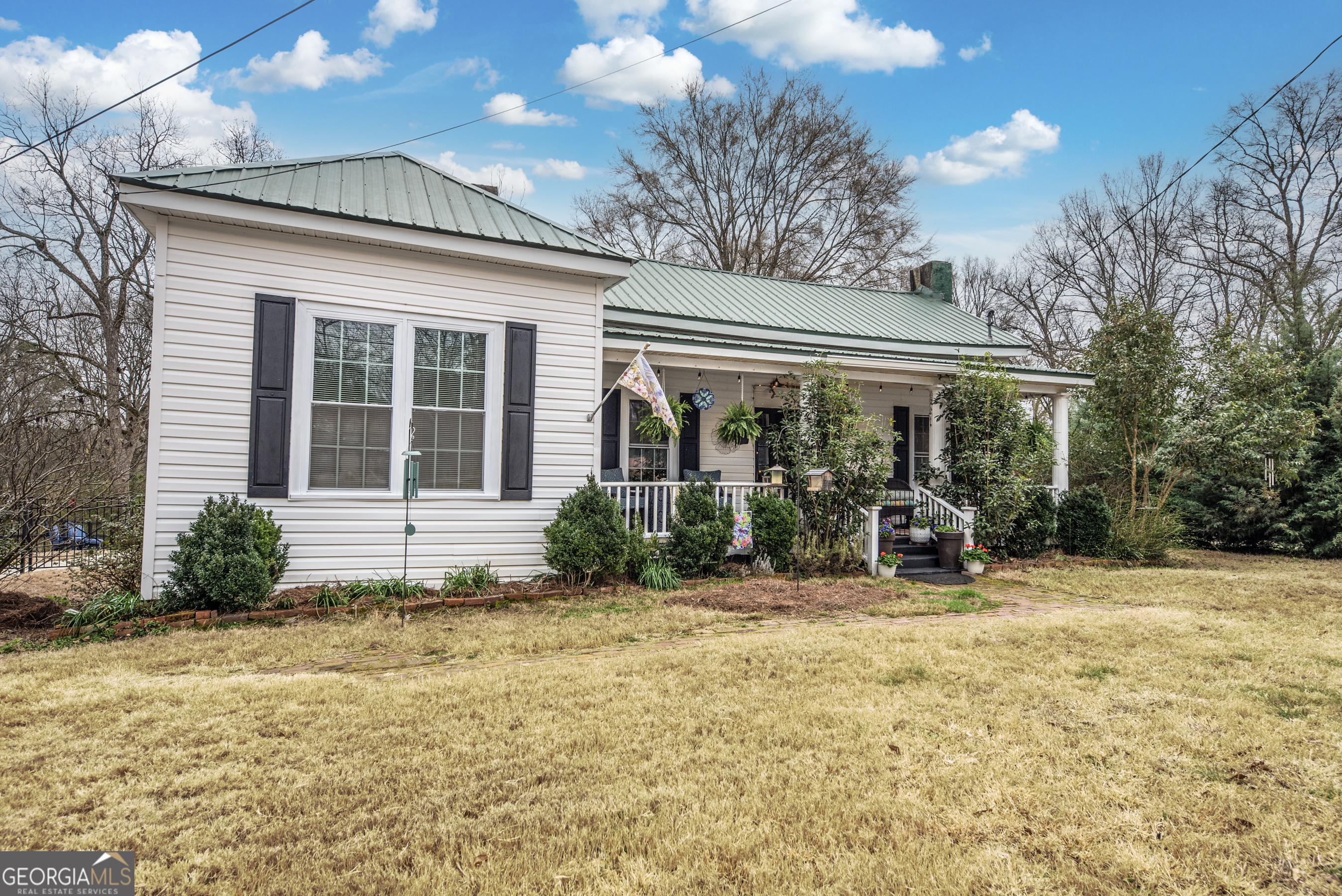 178 Fairplay Street Rutledge, GA 30663 - Photo 2 of 54 a front view of a house having patio