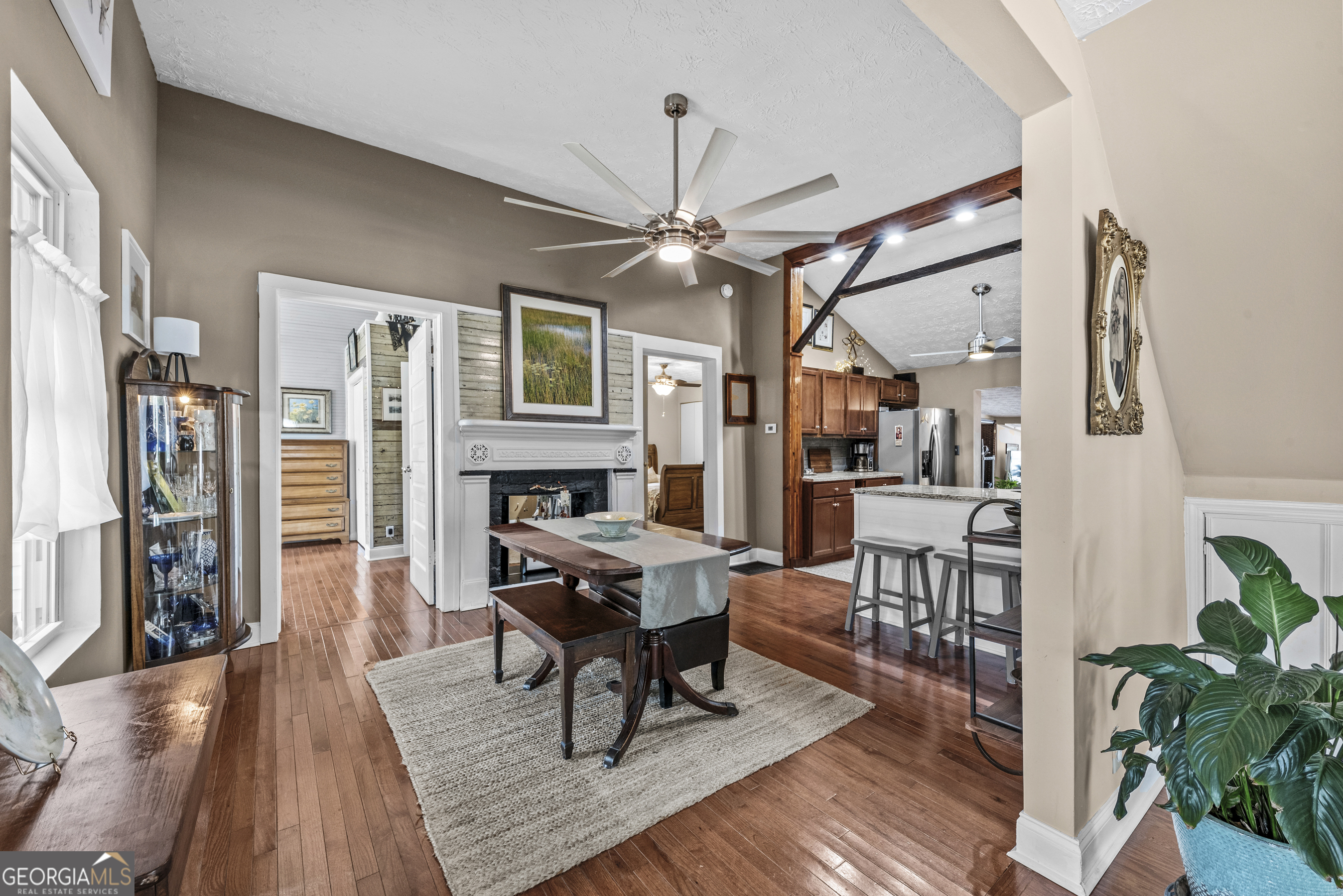 178 Fairplay Street Rutledge, GA 30663 - Photo 22 of 54 a living room with furniture and a fireplace