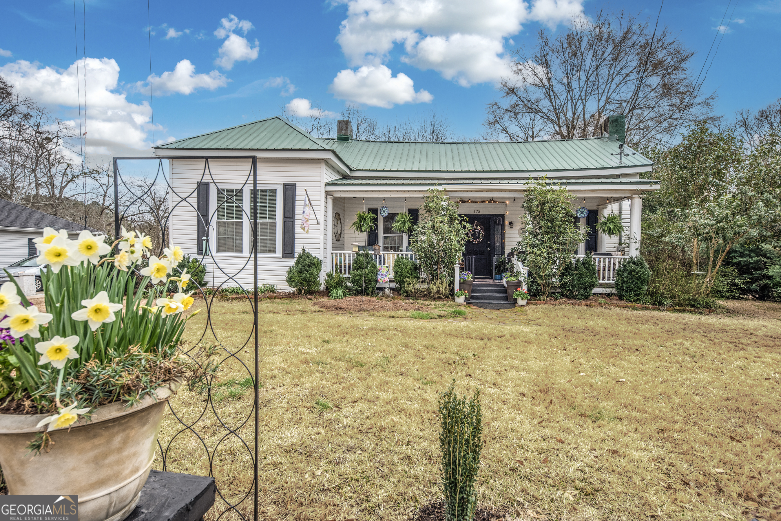 178 Fairplay Street Rutledge, GA 30663 - Photo 3 of 54 a house view with a seating space and garden view