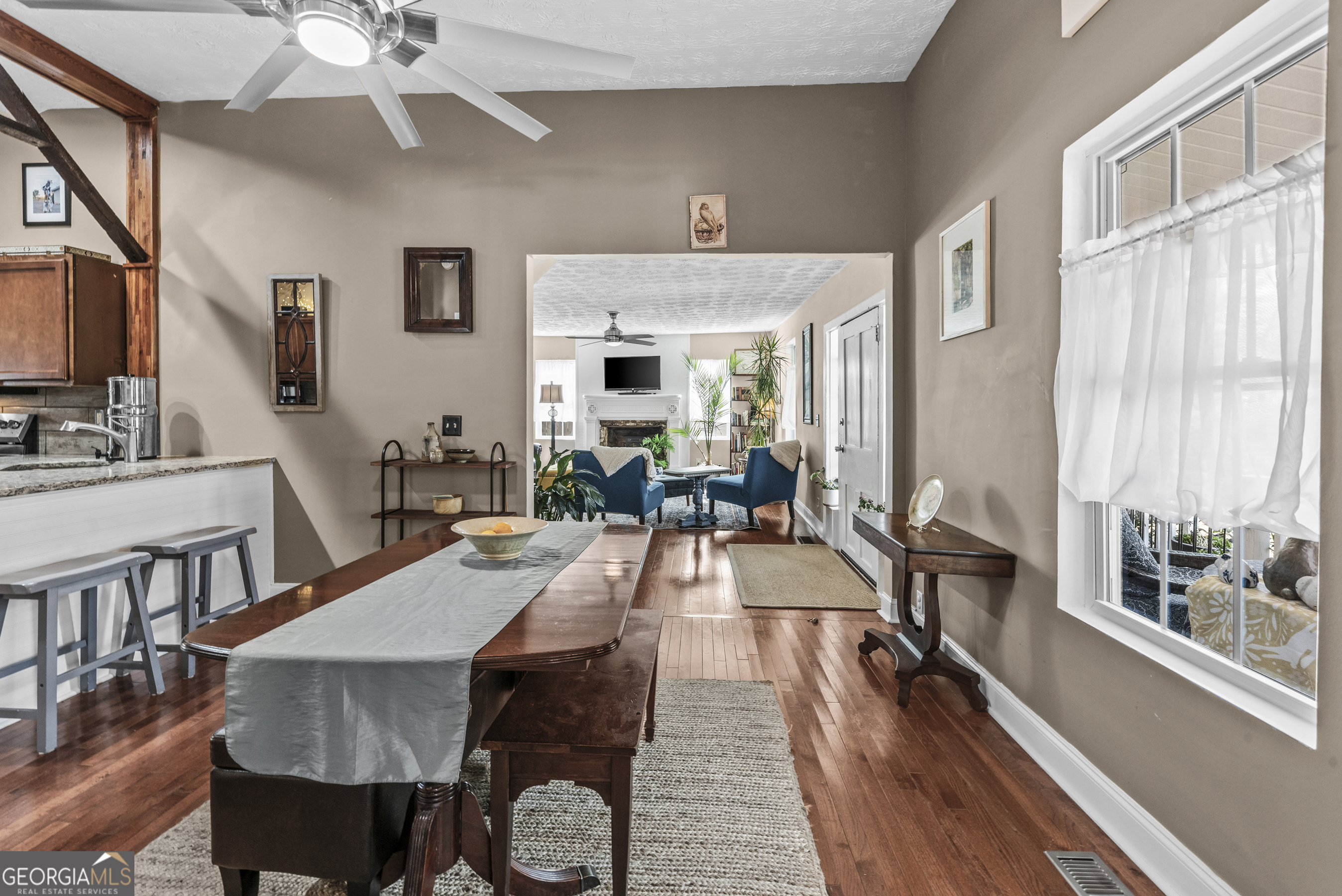 178 Fairplay Street Rutledge, GA 30663 - Photo 33 of 54 a view of a dining room with furniture window and wooden floor