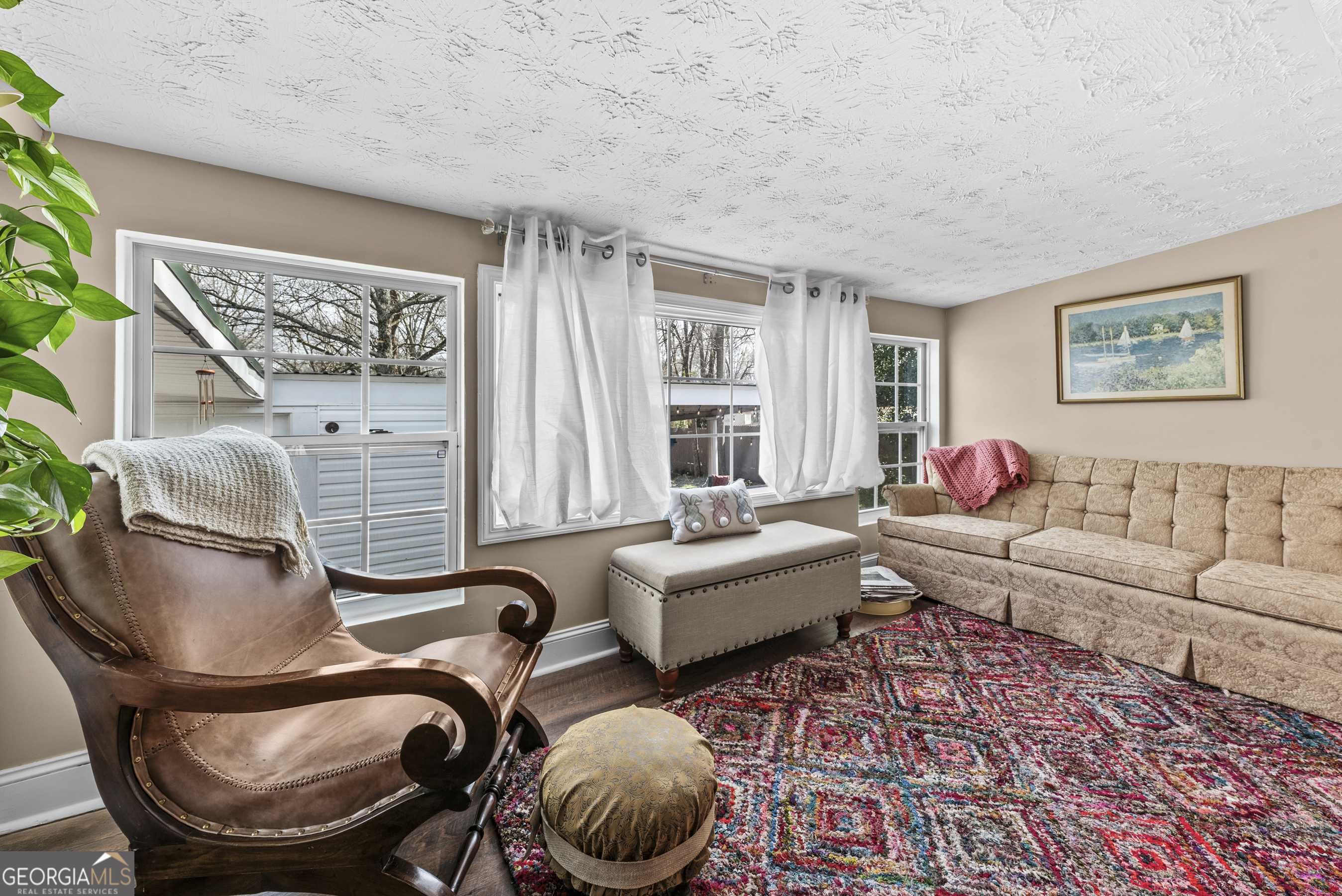 178 Fairplay Street Rutledge, GA 30663 - Photo 35 of 54 a living room with furniture and a large window