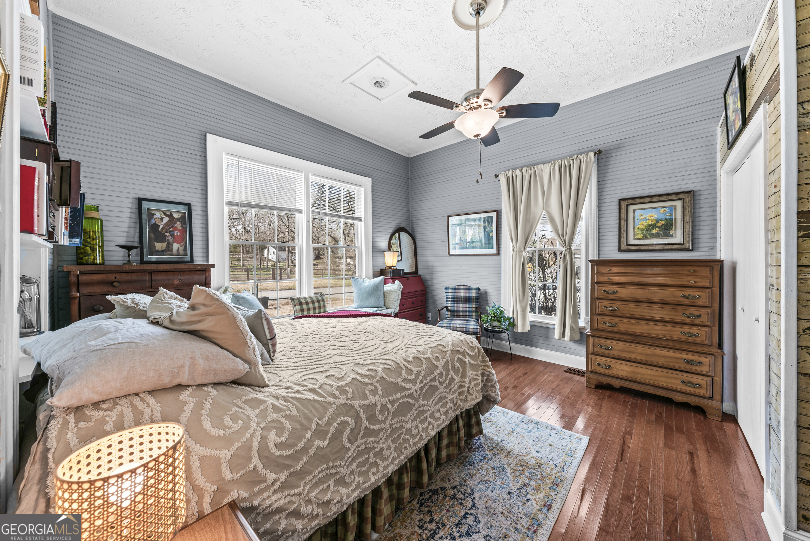 178 Fairplay Street Rutledge, GA 30663 - Photo 36 of 54 a bed sitting in a spacious bedroom next to a window