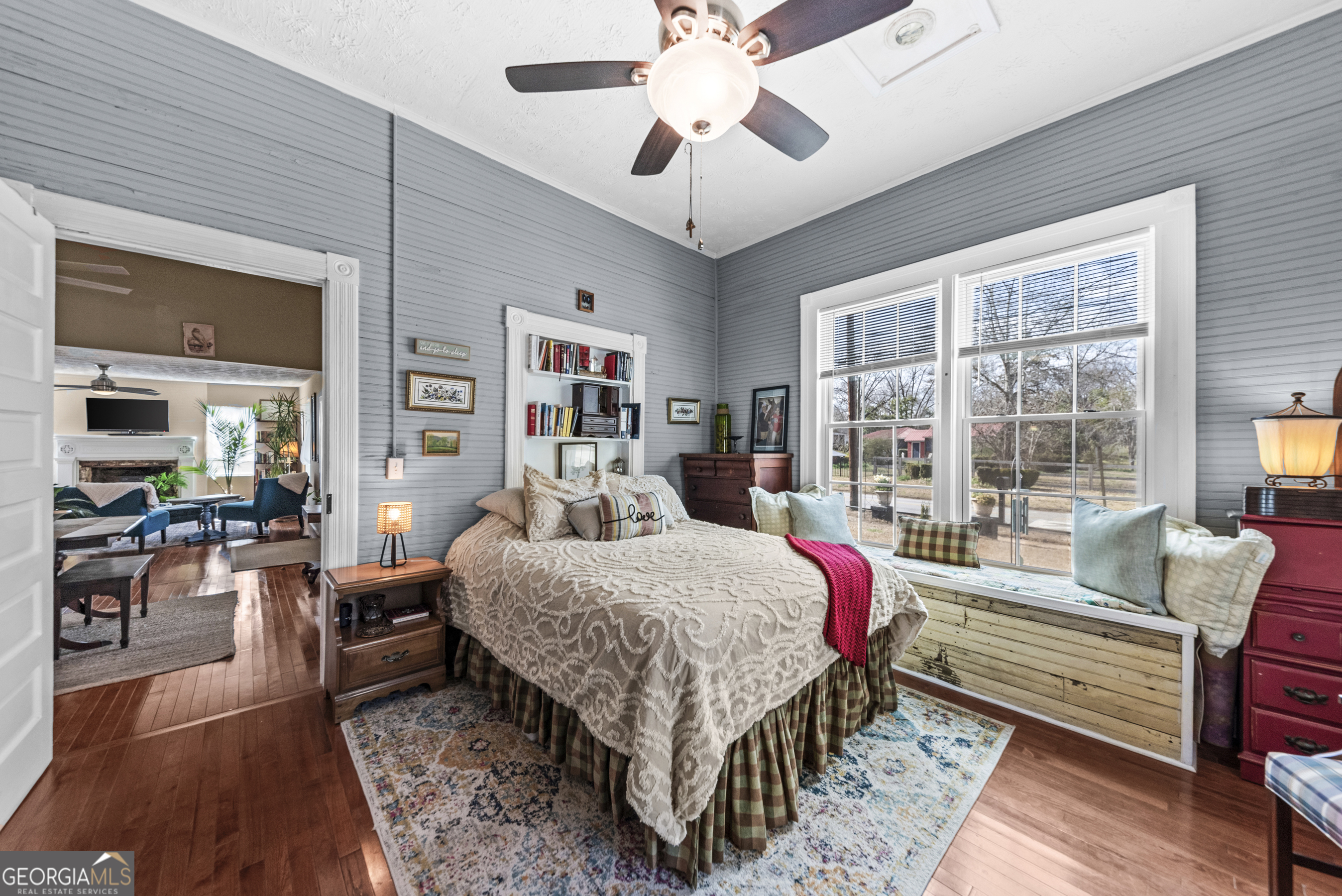 178 Fairplay Street Rutledge, GA 30663 - Photo 37 of 54 a bed room with furniture and a chandelier