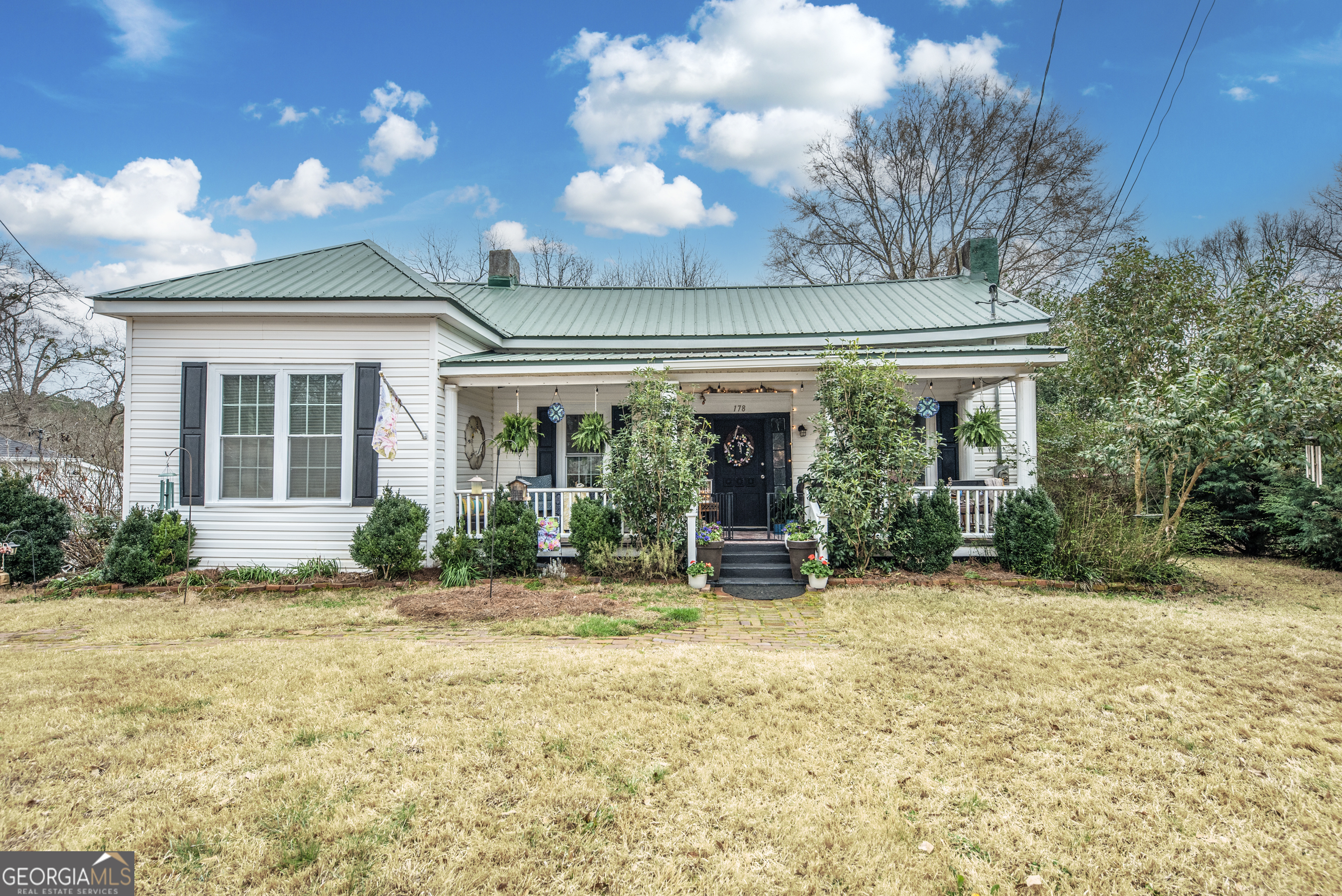 178 Fairplay Street Rutledge, GA 30663 - Photo 4 of 54 a front view of house with yard and green space