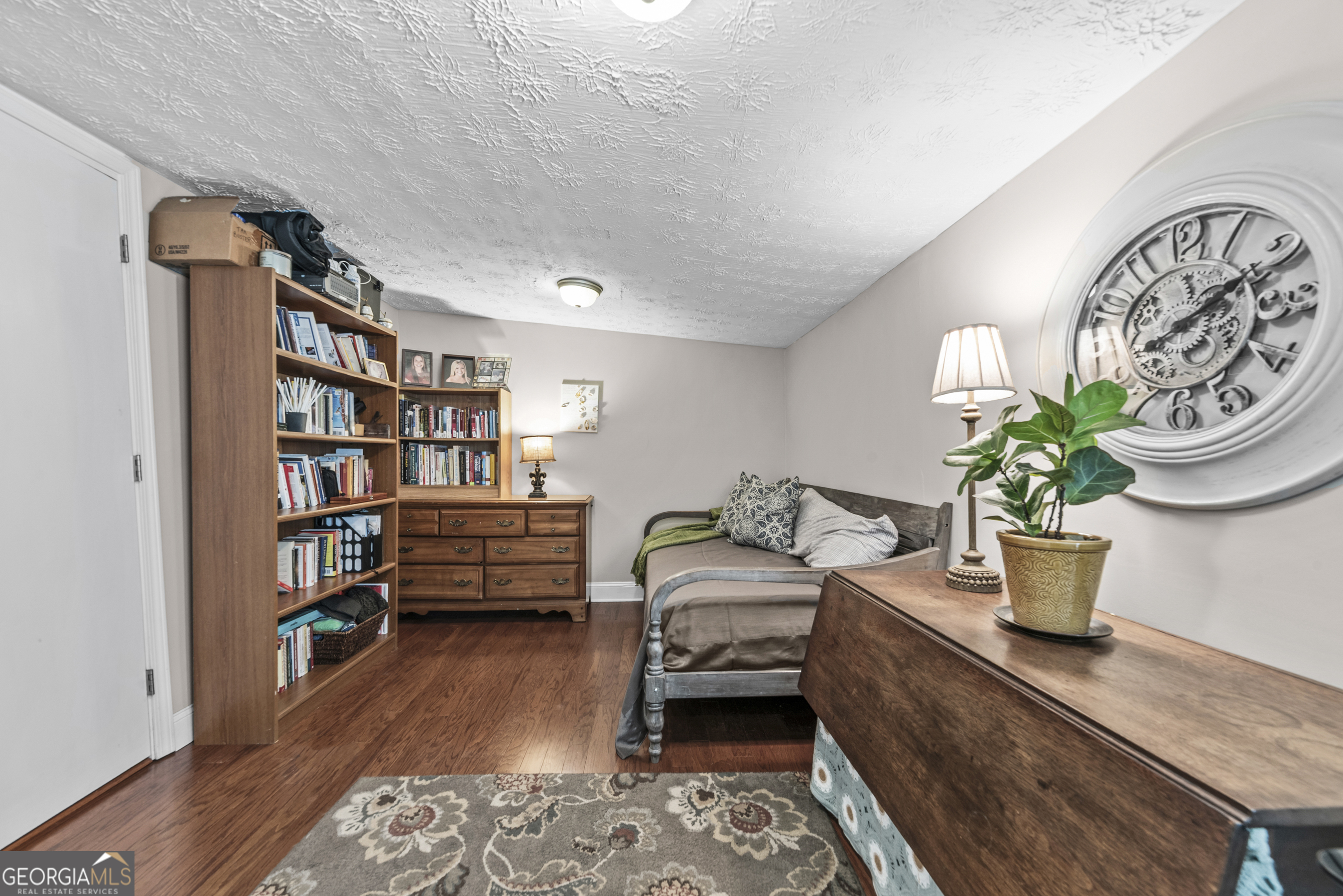 178 Fairplay Street Rutledge, GA 30663 - Photo 47 of 54 a living room with furniture and a potted plant