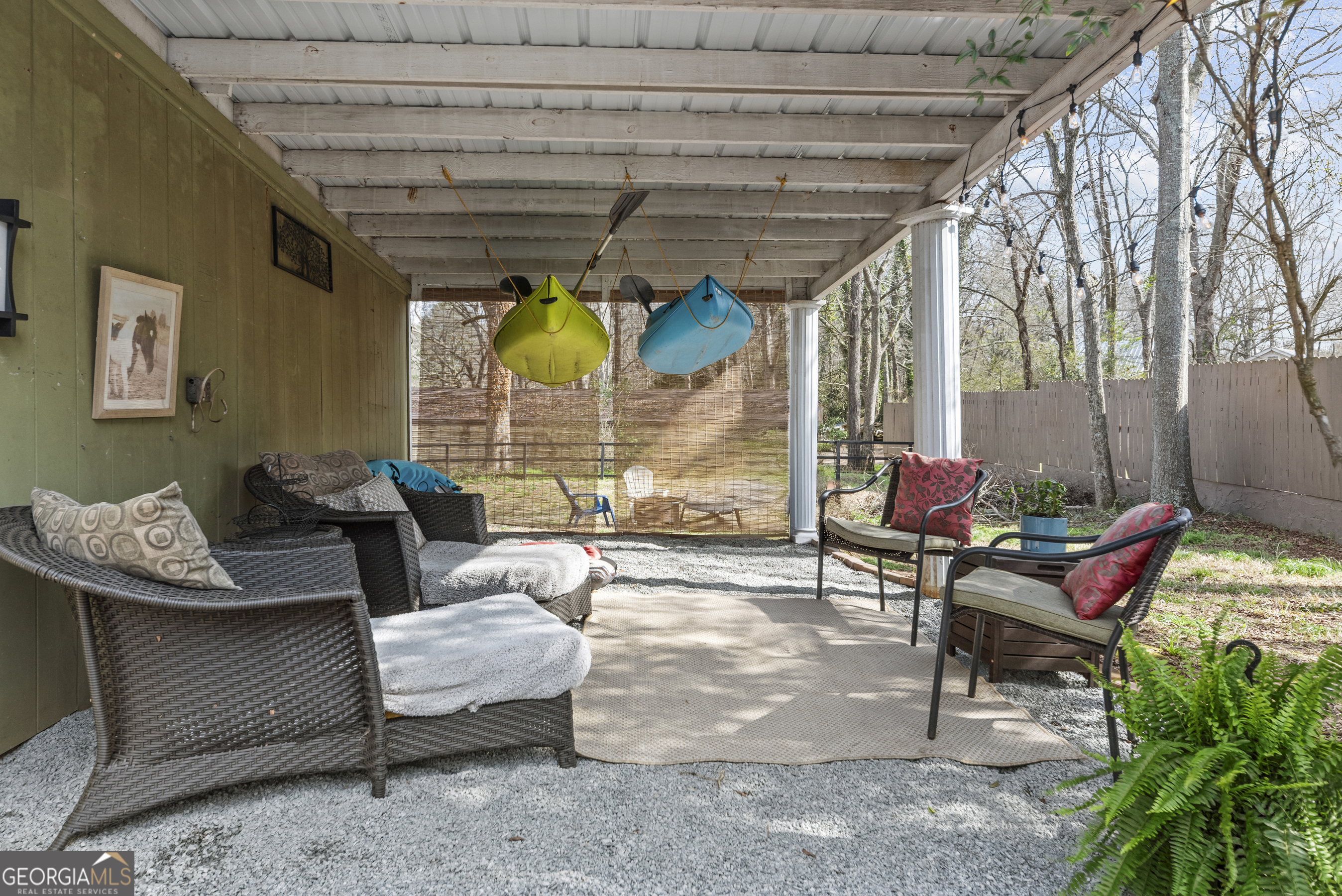 178 Fairplay Street Rutledge, GA 30663 - Photo 51 of 54 a outdoor space with patio the couches and a dining table with the garden view