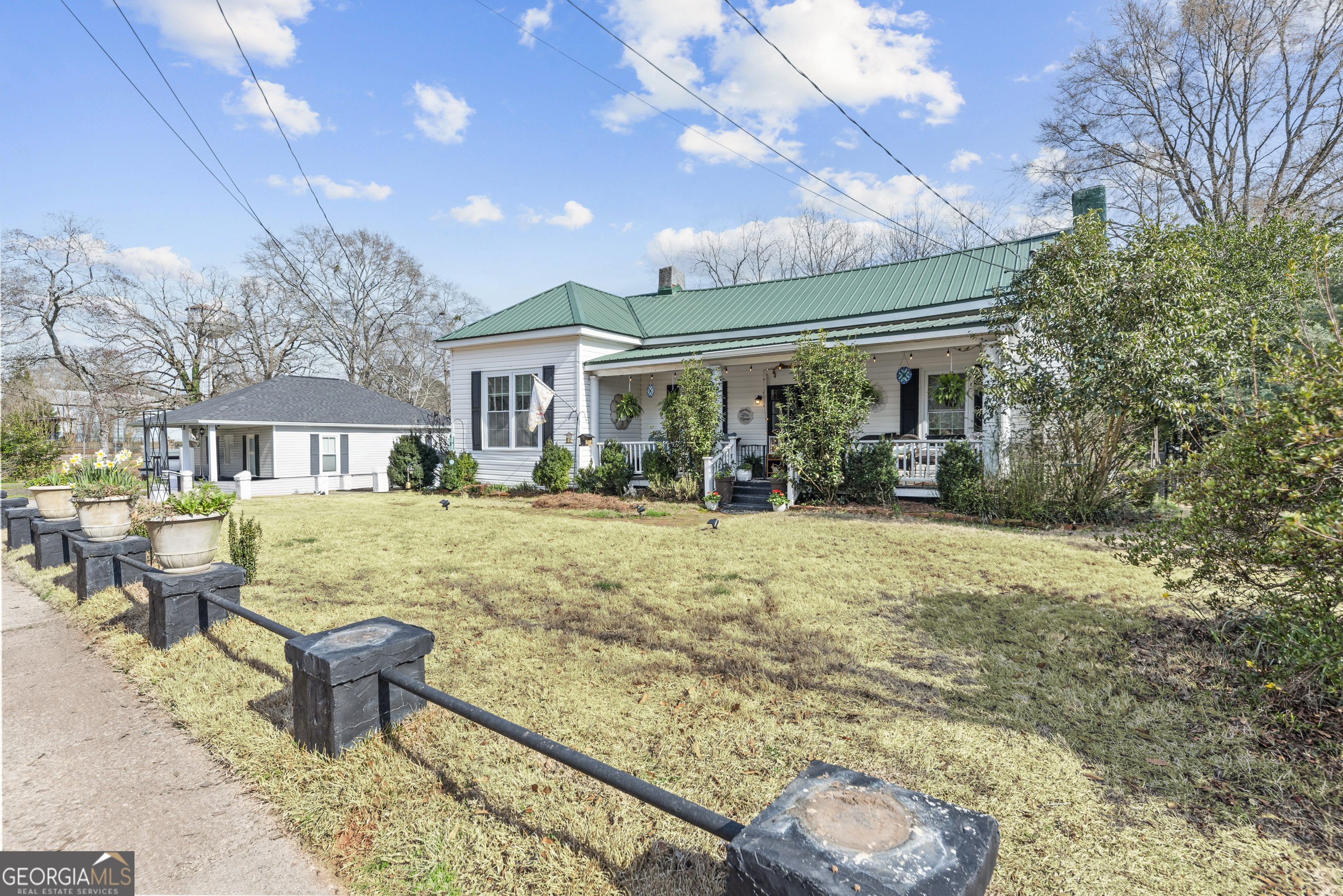 178 Fairplay Street Rutledge, GA 30663 - Photo 53 of 54 a front view of a house with garden