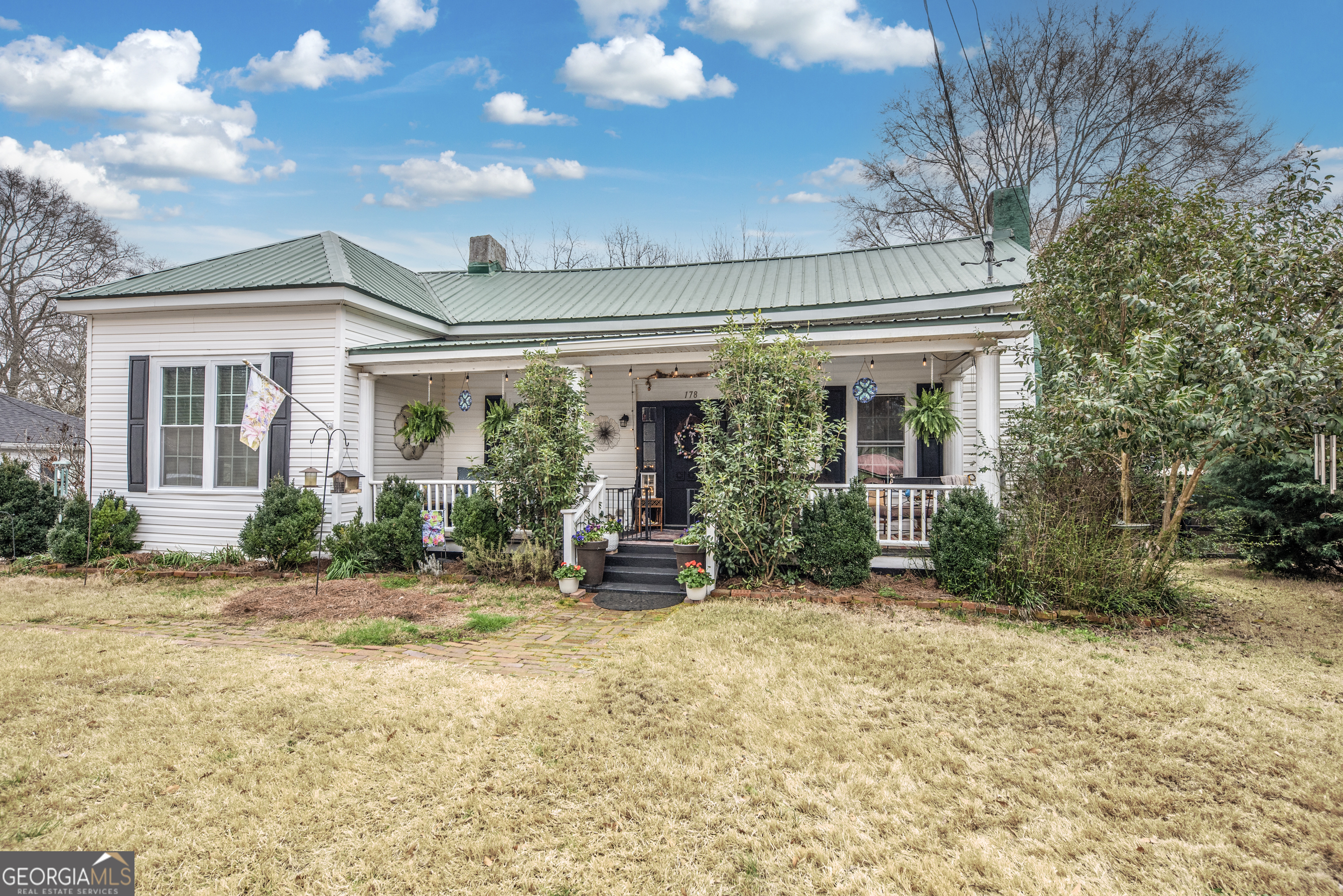 178 Fairplay Street Rutledge, GA 30663 - Photo 54 of 54 a view of a house with backyard porch and sitting area