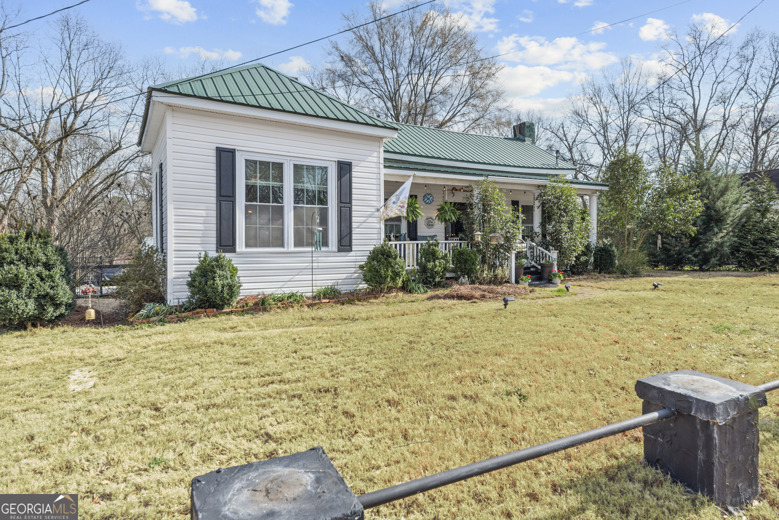 178 Fairplay Street Rutledge, GA 30663 - Photo 8 of 54 a front view of a house with garden