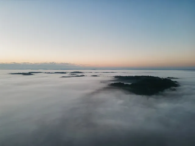 a view of an ocean and city