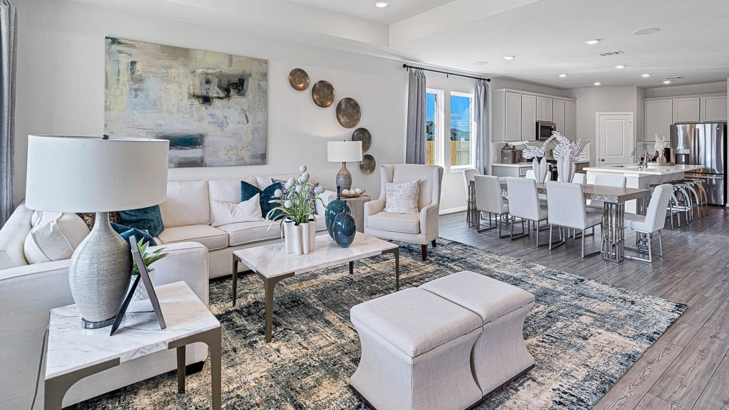 1202 Buffalo Run Tomball, TX 77375 - Photo 19 of 45 a living room with furniture and a rug
