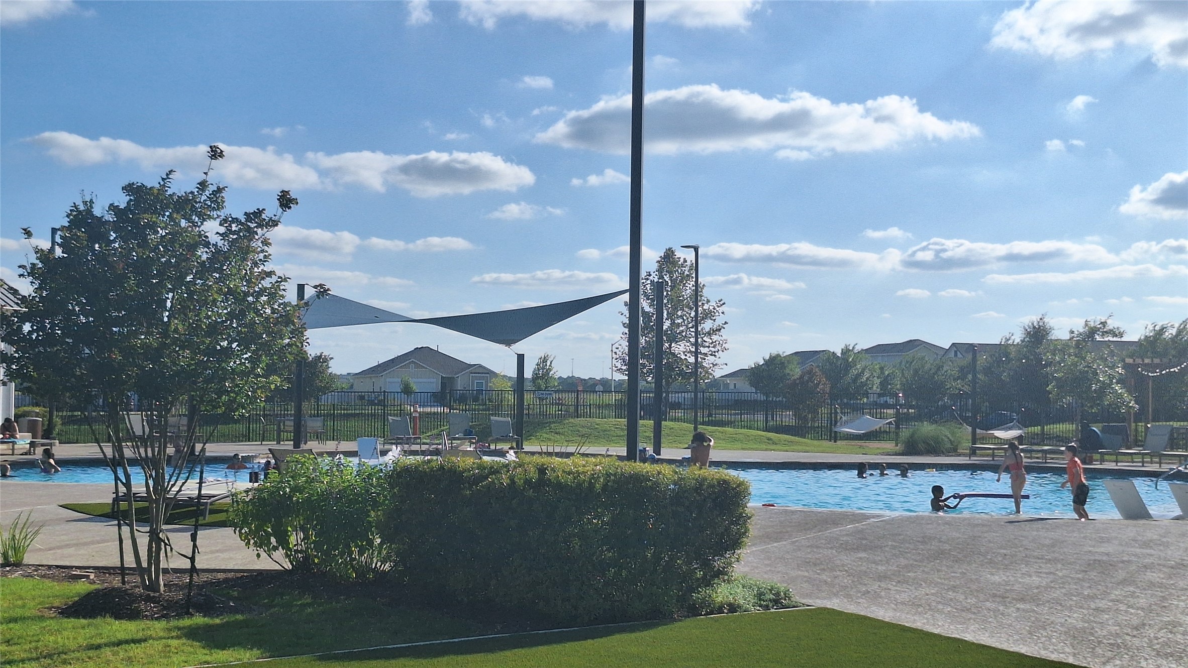 2771 Winding Creek Road Kyle, TX 78640 - Photo 20 of 24 A refreshing community pool offers a perfect escape on warm, sunny days.