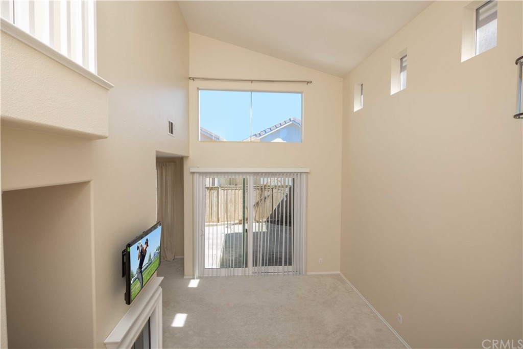 1 Quebec Aliso Viejo, CA 92656 - Photo 13 of 40 a view of a hallway with wooden floor and a bedroom