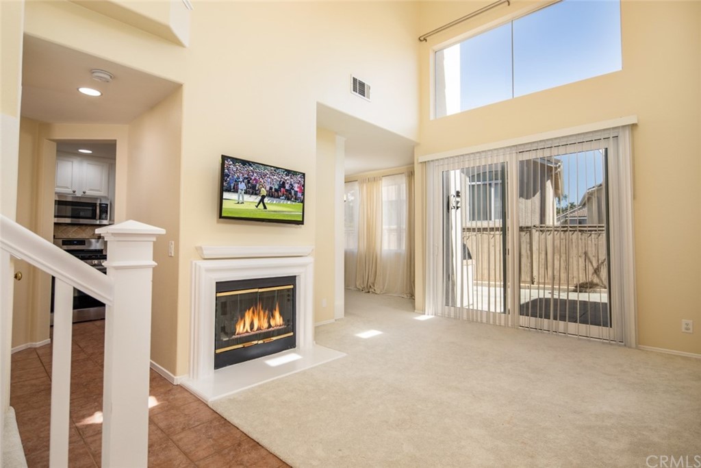 1 Quebec Aliso Viejo, CA 92656 - Photo 3 of 40 a view of an empty room with a fireplace and a window