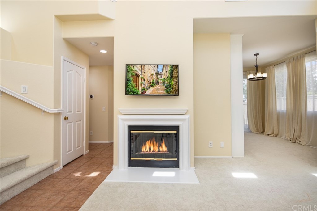 1 Quebec Aliso Viejo, CA 92656 - Photo 4 of 40 a view of a livingroom with a fireplace and window