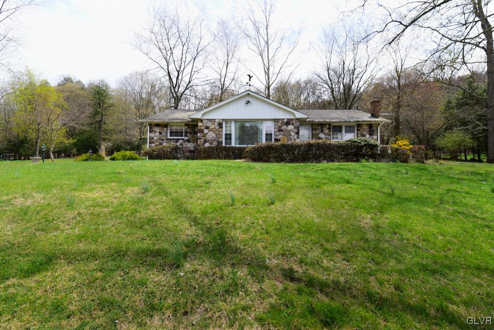 1177 Beaver Valley Road Stroudsburg, PA 18360 - Photo 1 of 46 a house with huge green field in front of it