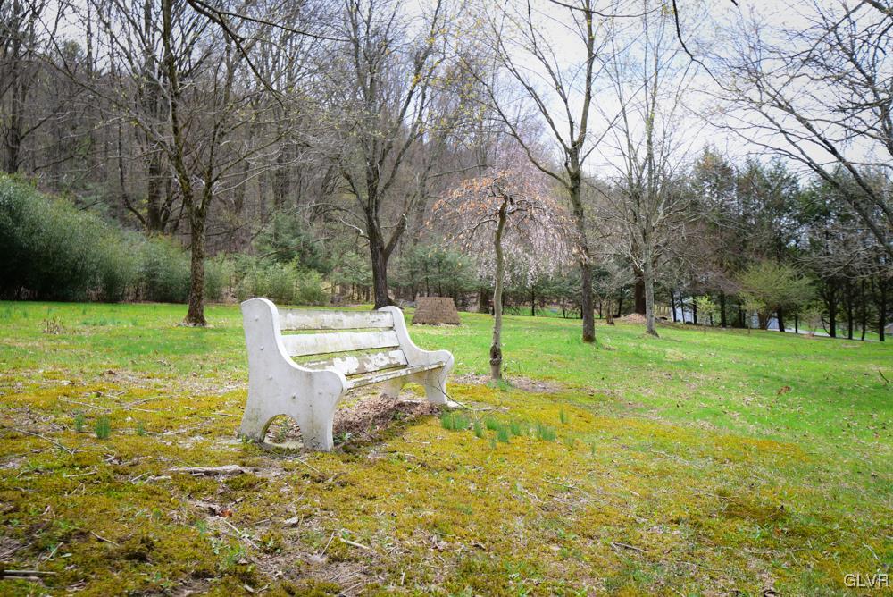 1177 Beaver Valley Road Stroudsburg, PA 18360 - Photo 11 of 46 a view of a backyard with a garden and trees