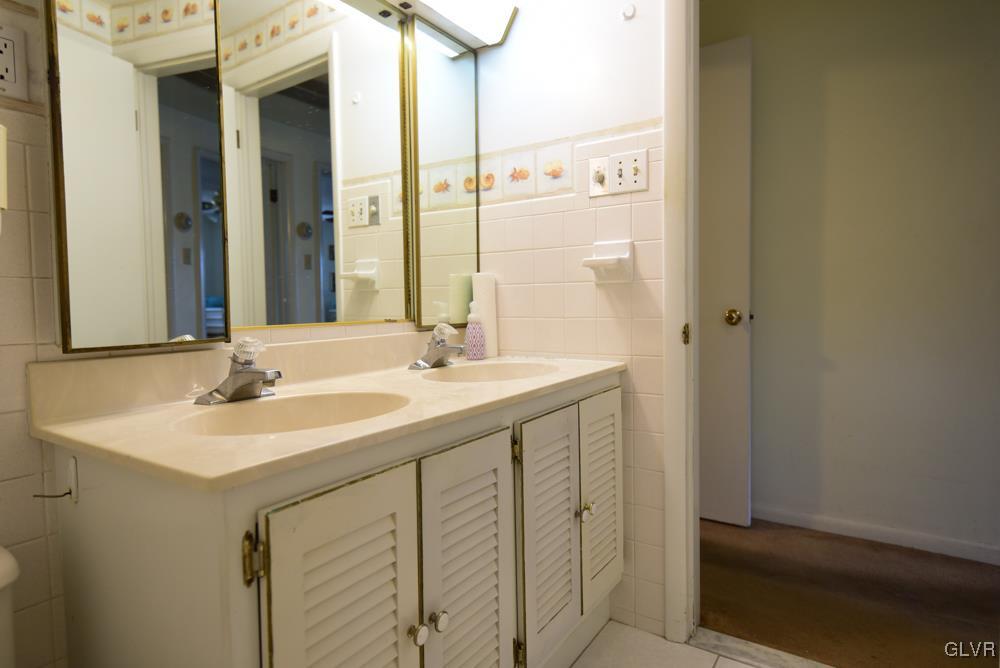 1177 Beaver Valley Road Stroudsburg, PA 18360 - Photo 26 of 46 a bathroom with a sink and a mirror
