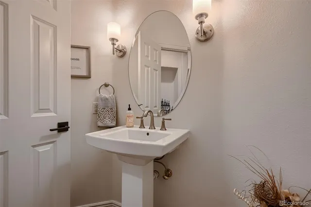a view of a house with a yard porch and sitting area