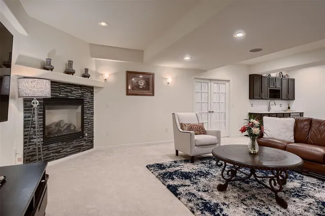 a living room with furniture and a table