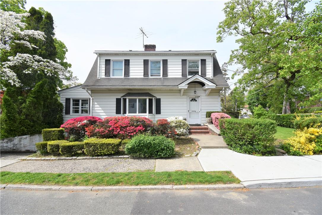 113 Mile Square Road Yonkers, NY 10701 - Photo 1 of 1 front view of a house with a yard