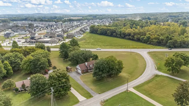 an aerial view of ocean with residential house with lake view