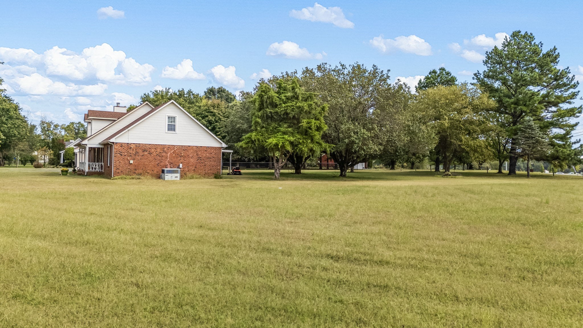 5665 Old Salem Road Rockvale, TN 37153 - Photo 22 of 41 a front view of a house with a garden and yard