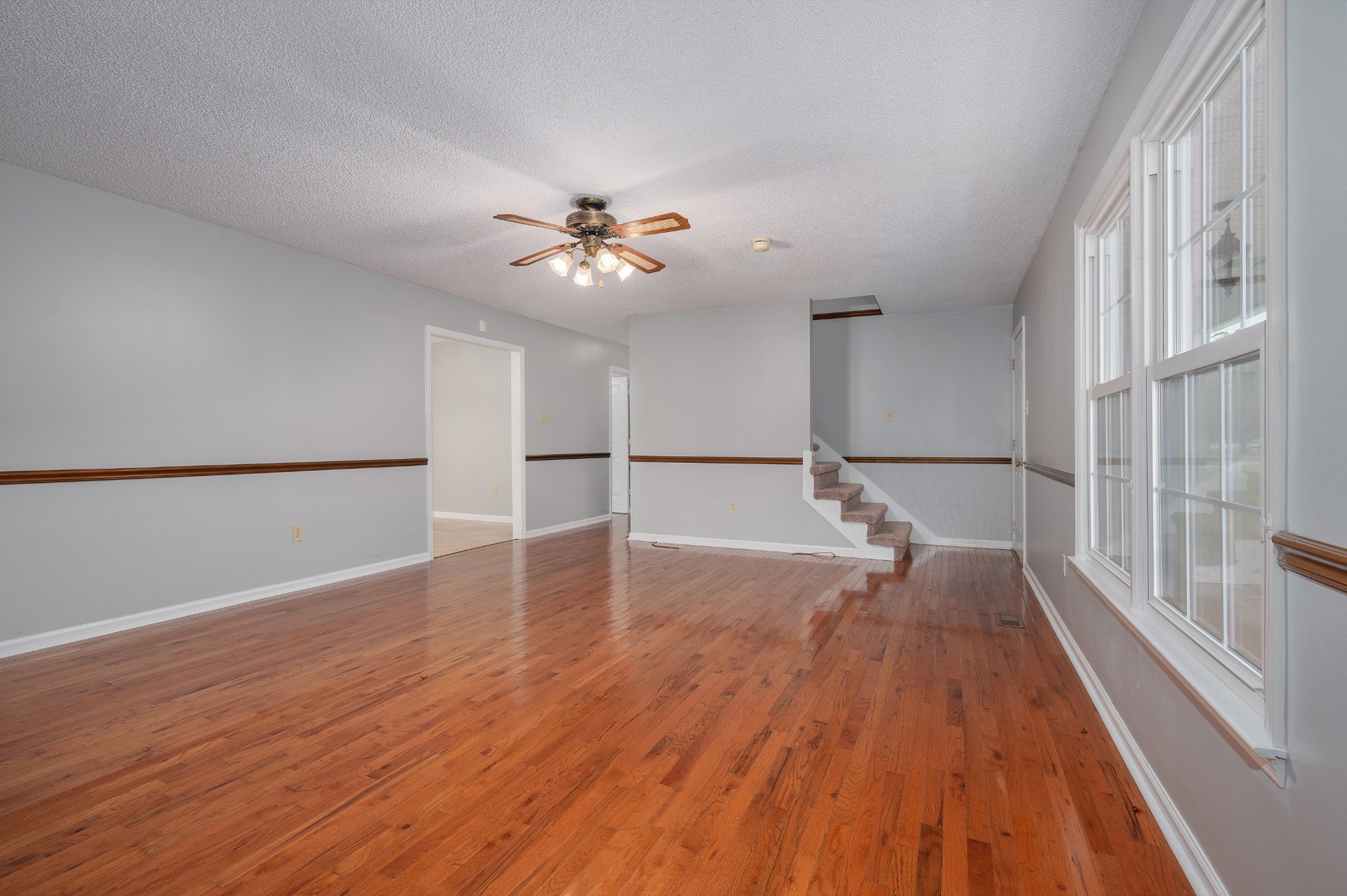 5665 Old Salem Road Rockvale, TN 37153 - Photo 25 of 41 a view of empty room with wooden floor and fan