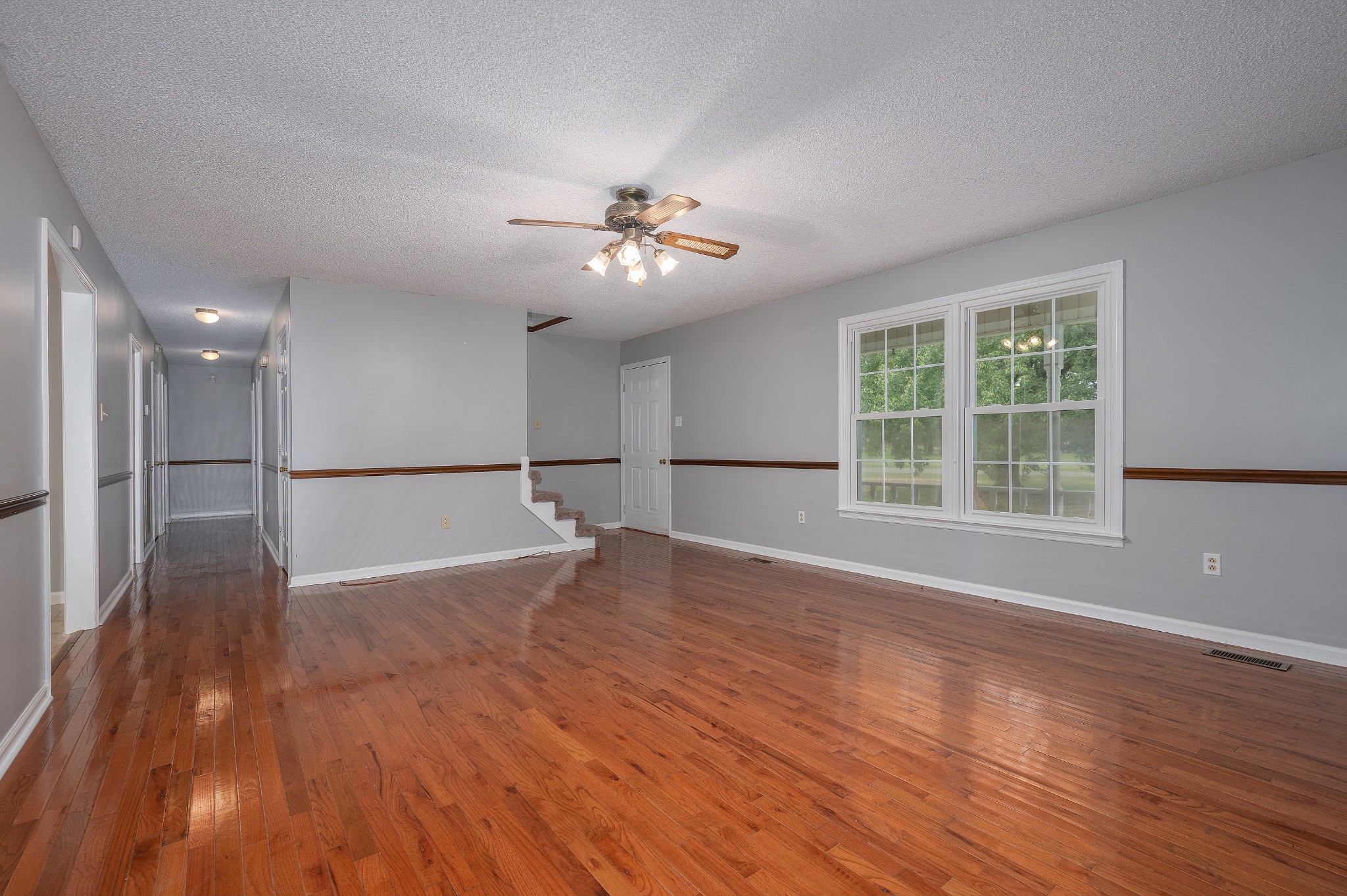 5665 Old Salem Road Rockvale, TN 37153 - Photo 26 of 41 a view of empty room with wooden floor and fan