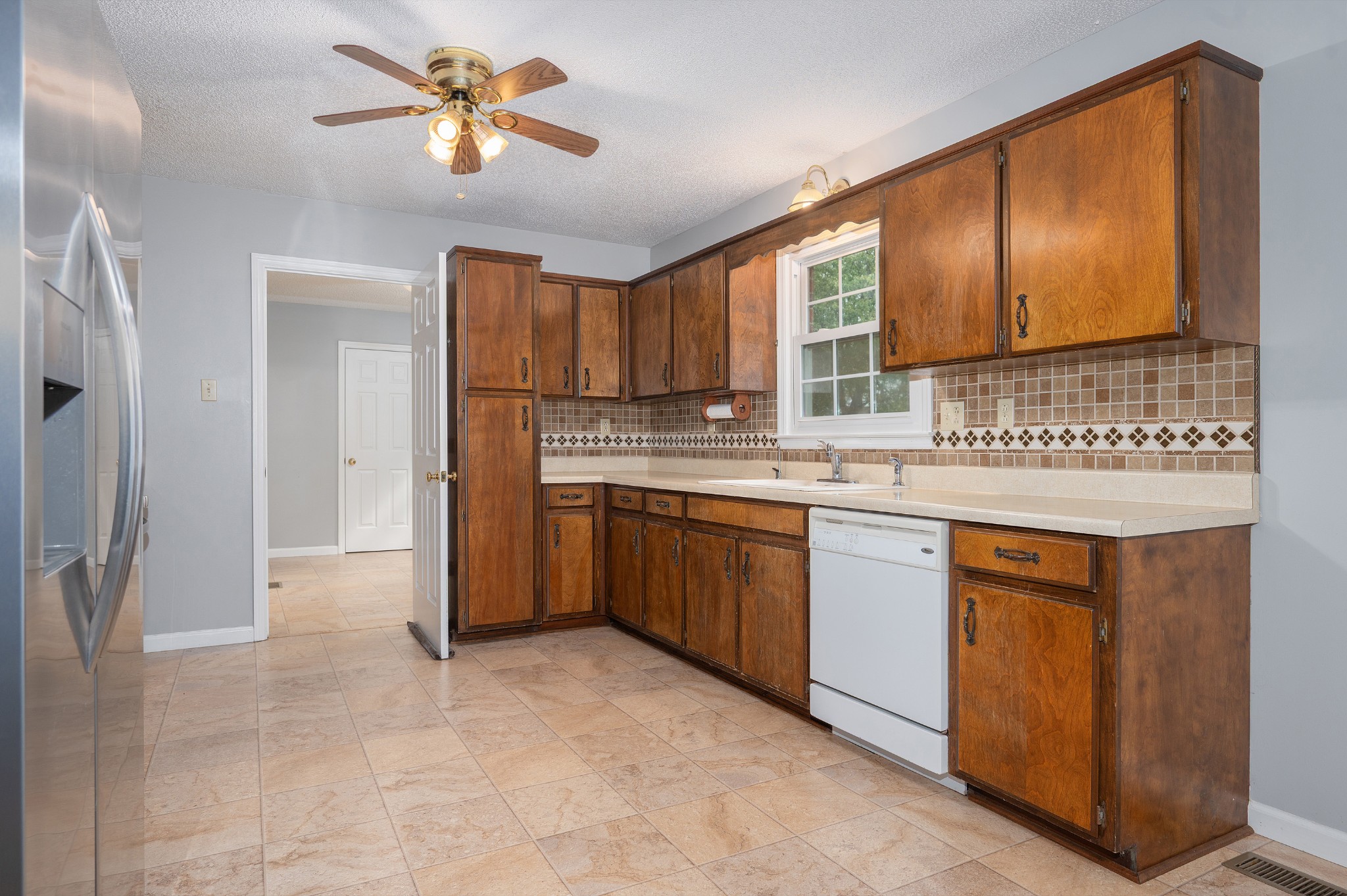 5665 Old Salem Road Rockvale, TN 37153 - Photo 29 of 41 a kitchen with a sink cabinets and appliances