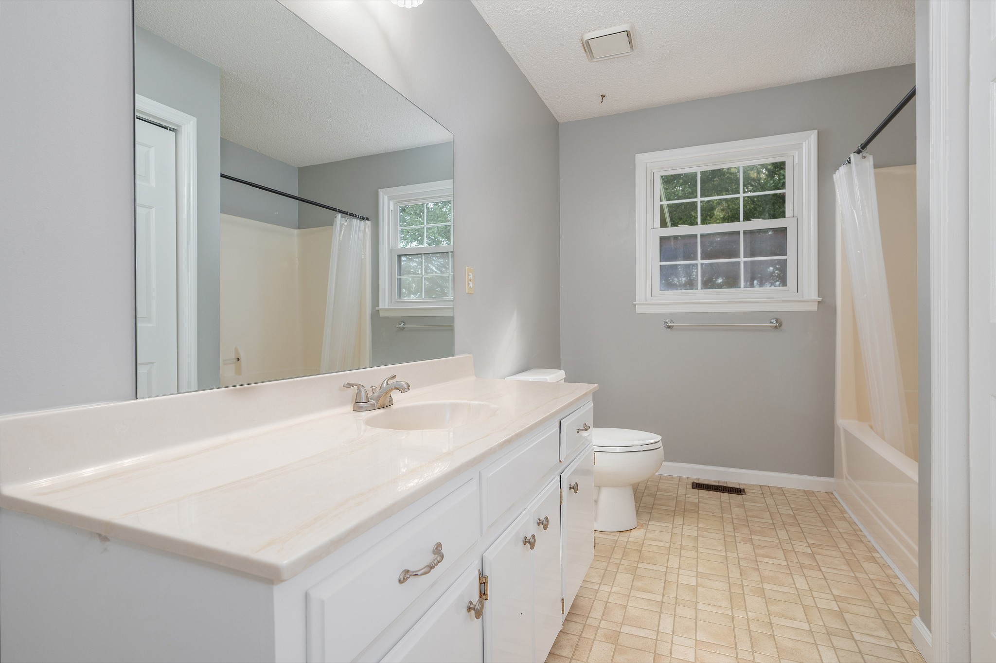 5665 Old Salem Road Rockvale, TN 37153 - Photo 34 of 41 a bathroom with a sink a toilet and a window