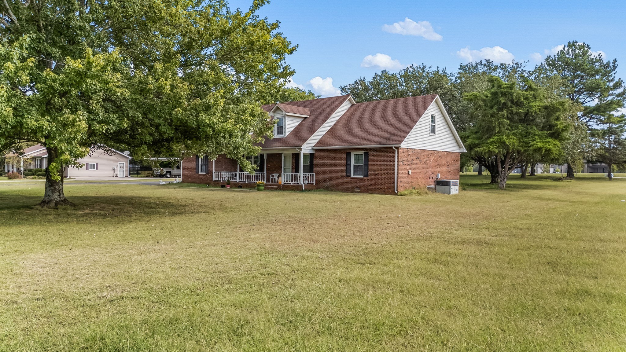 5665 Old Salem Road Rockvale, TN 37153 - Photo 7 of 41 a front view of a house with a garden