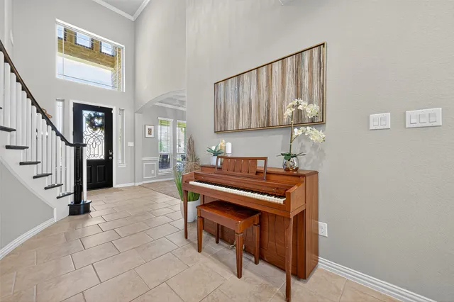 a view of a hallway with seating area