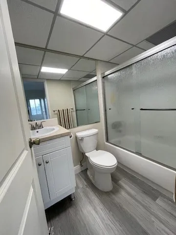 a bathroom with a toilet a sink and a bathtub