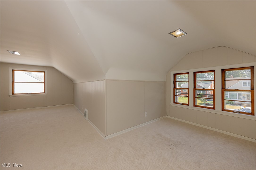 29103 Barjode Road Eastlake, OH 44095 - Photo 15 of 31 Bonus room with vaulted ceiling and light carpet