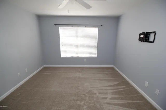 a view of a hallway with closet